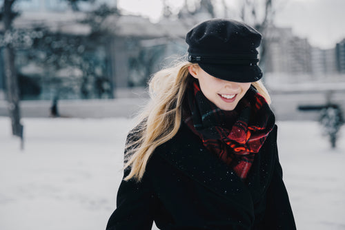 smiling woman on snowy afternoon