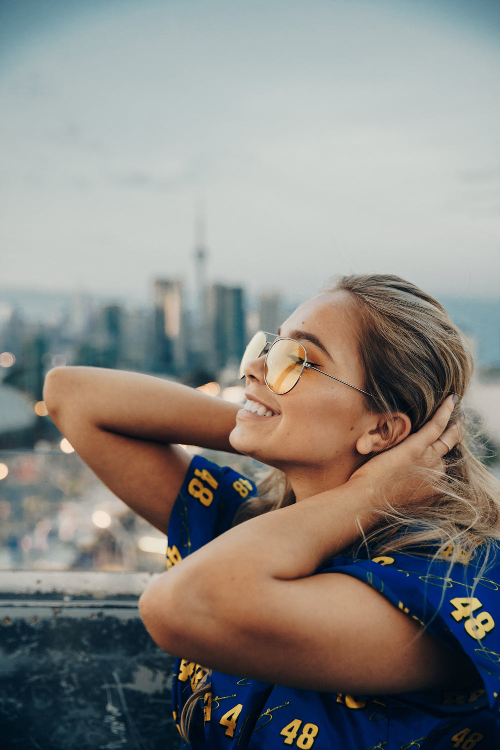 smiling woman with skyline