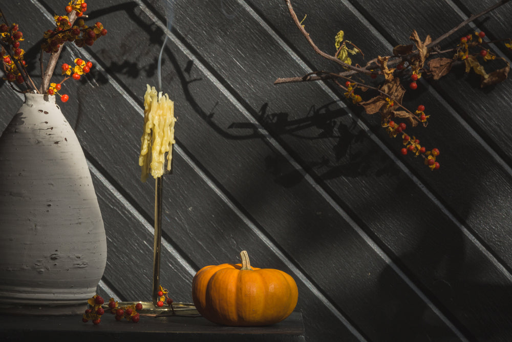 smoking candle with pumpkin