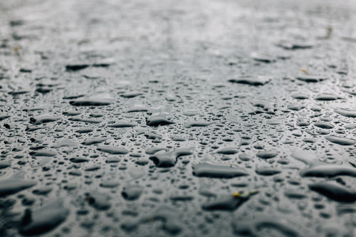 smooth surface with droplets of water