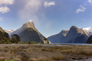 snow capped mountains under clear blue sky