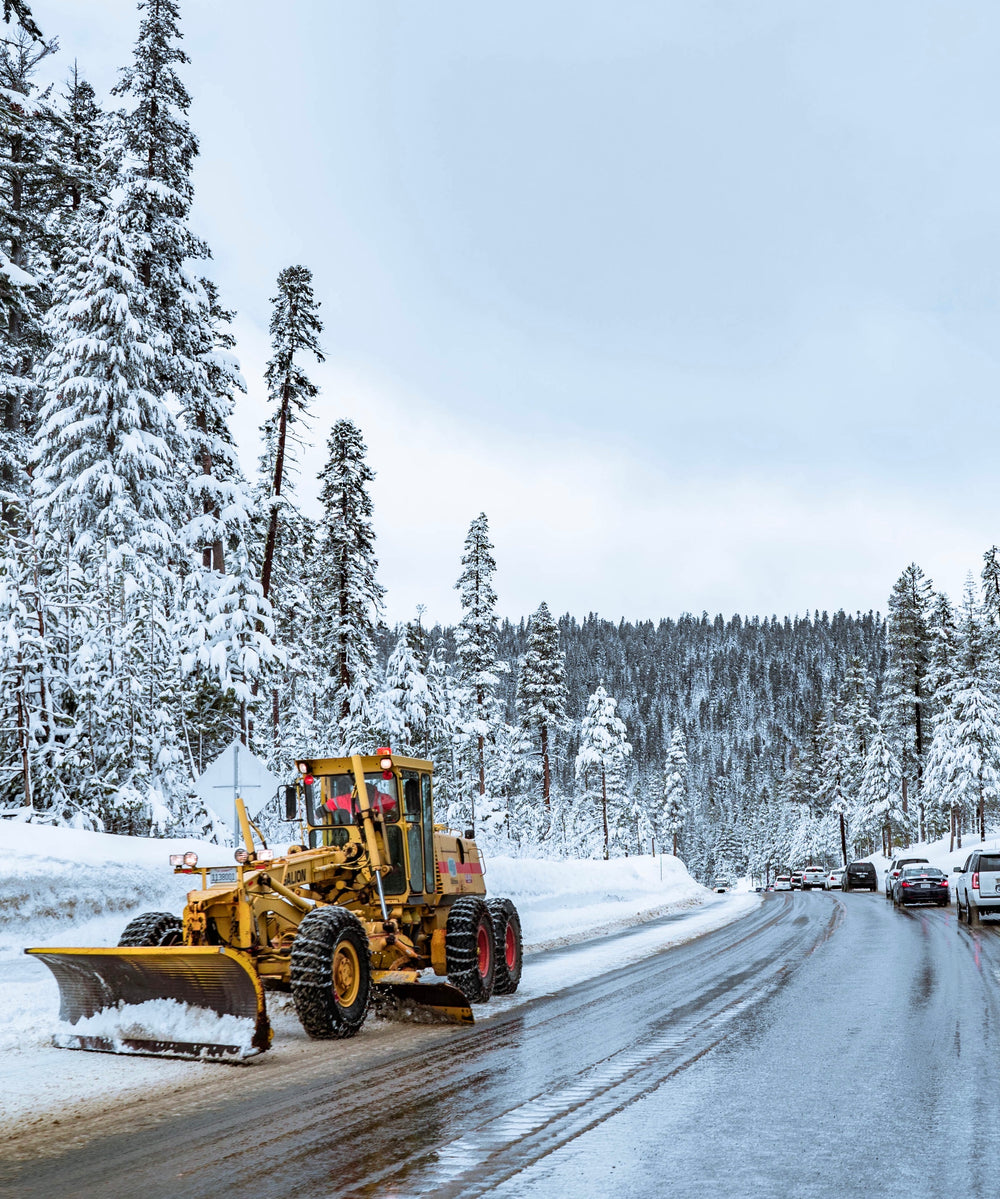 snow plough on forest road