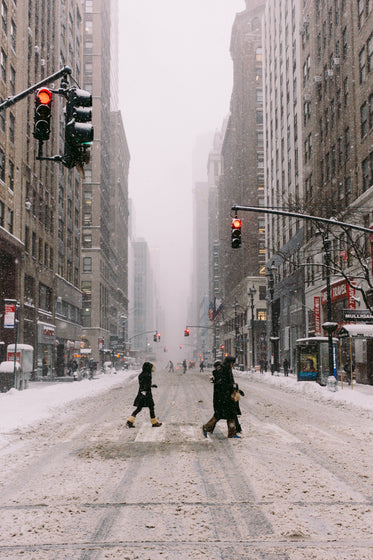 snowy crosswalk in wintery city