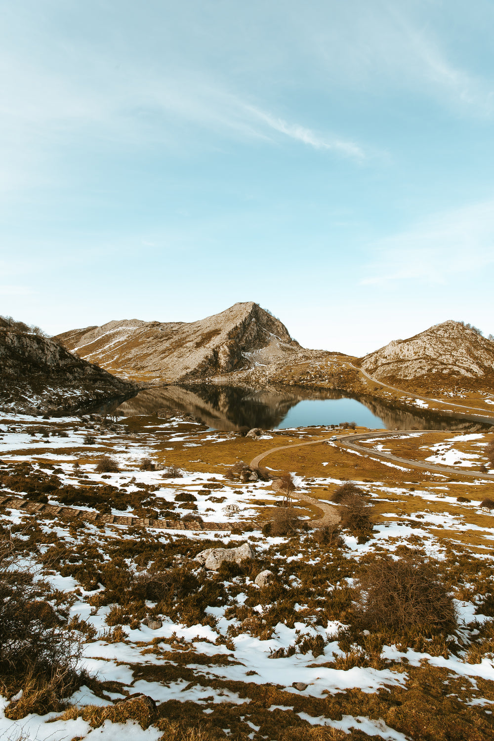 snowy lake with a mountian view