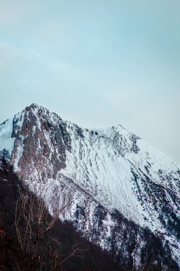 snowy mountains blend into the sky