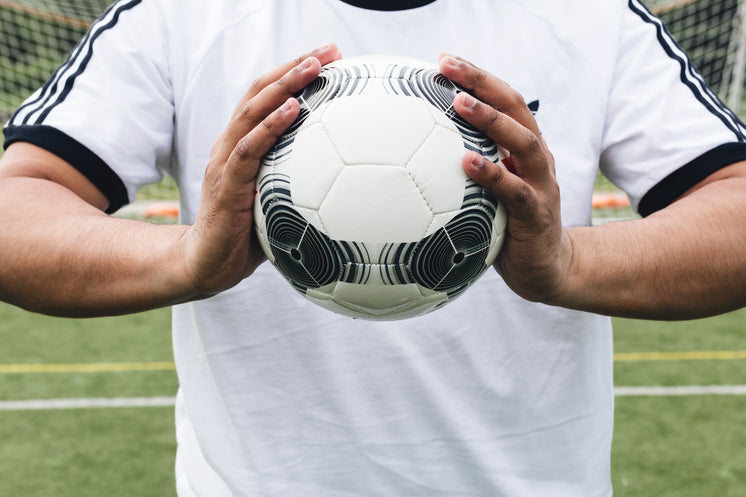 Soccer Ball In Athletes Hands