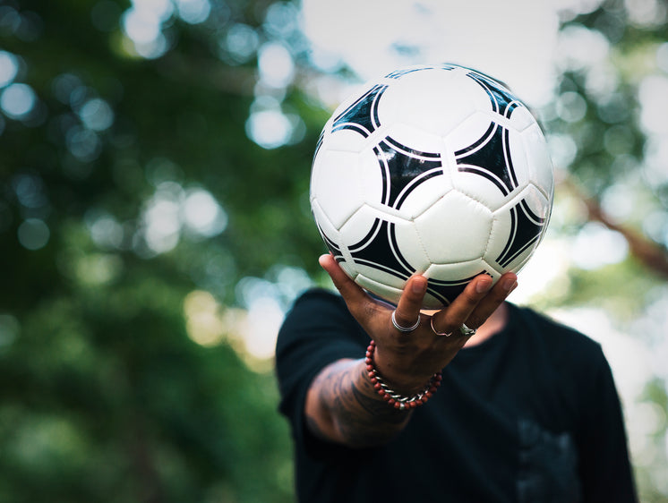 soccer-ball-in-hand-at-park.jpg?width=74