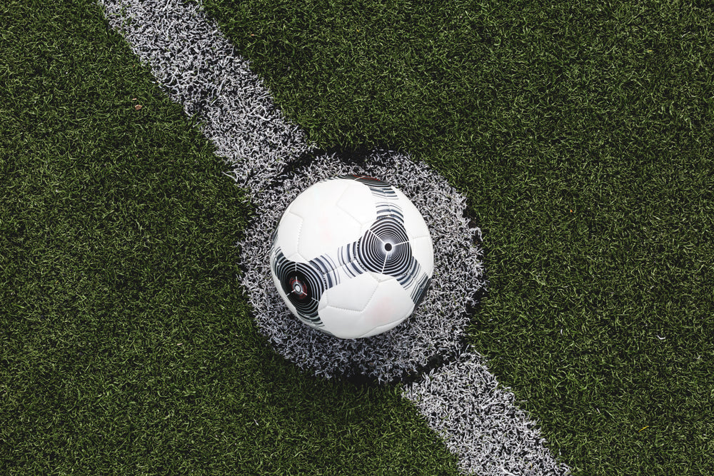 soccer ball lined up for kick