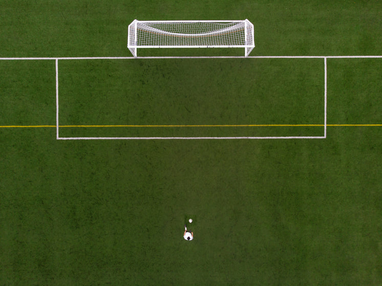 Soccer Player In Penalty Kick Position Drone View