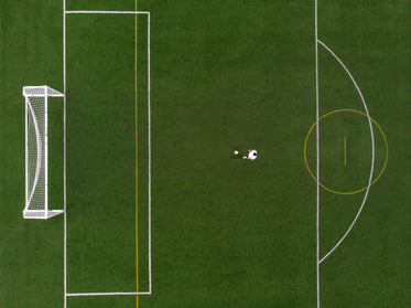 soccer player in penalty position drone view