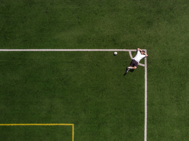 soccer player lounging in the corner