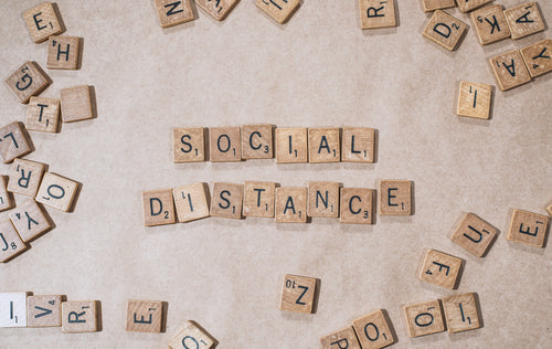 social distance on brown background