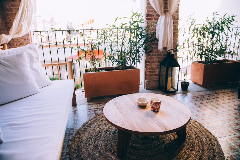 sofa and coffee table on large balcony