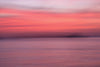 soft gradient of sunset over water