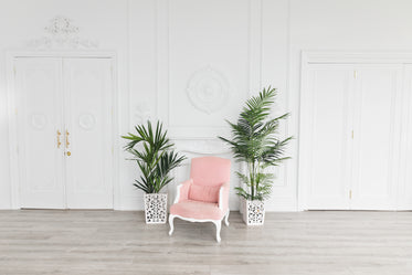 soft pink cushioned armchair in stately salon