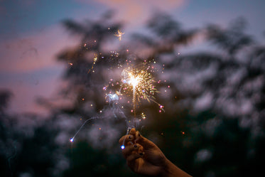 sparkler bursts into multiple colors