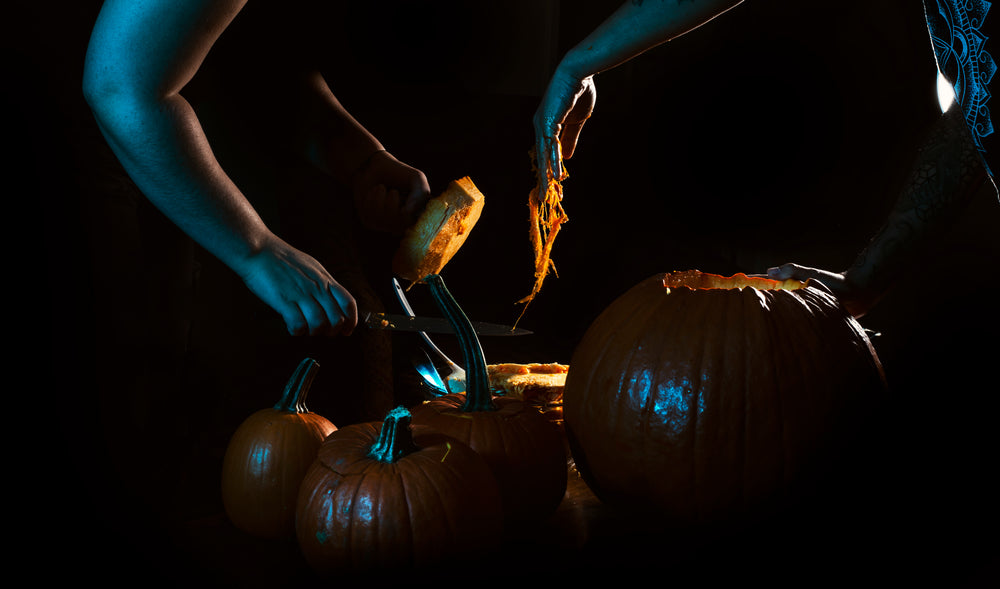 spooky pumpkins being prepared for carving halloween