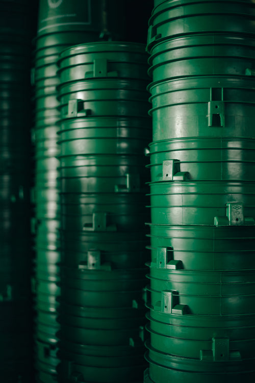 stacked green tubs