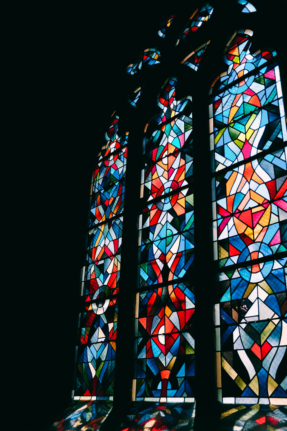 stained glass window panes in a gothic church window