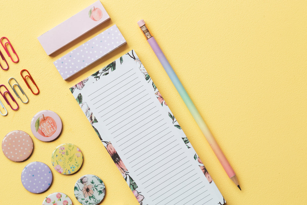 stationery and pin badges