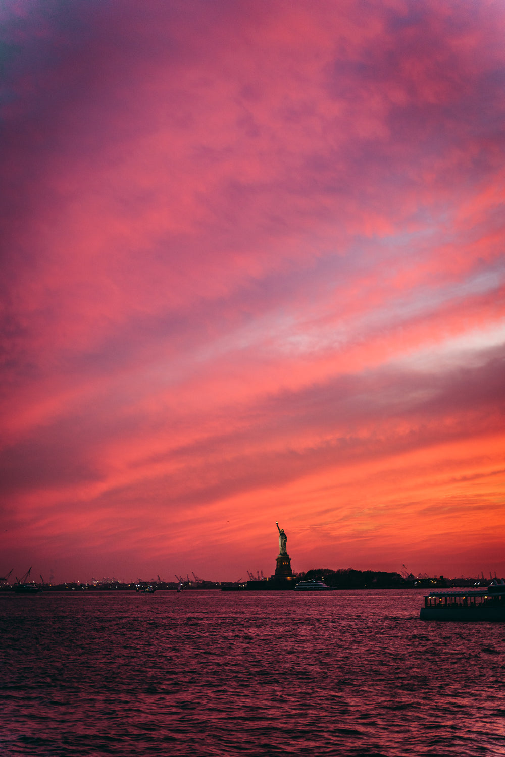 statue of liberty at sunset