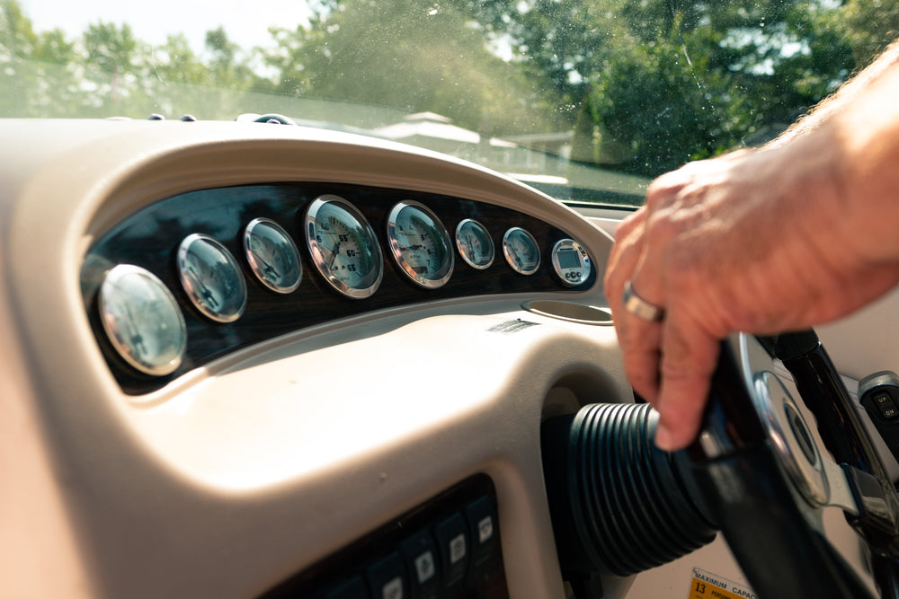 steering wheel and dashboard on boat