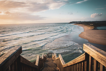 steps down to the beach at sunrise