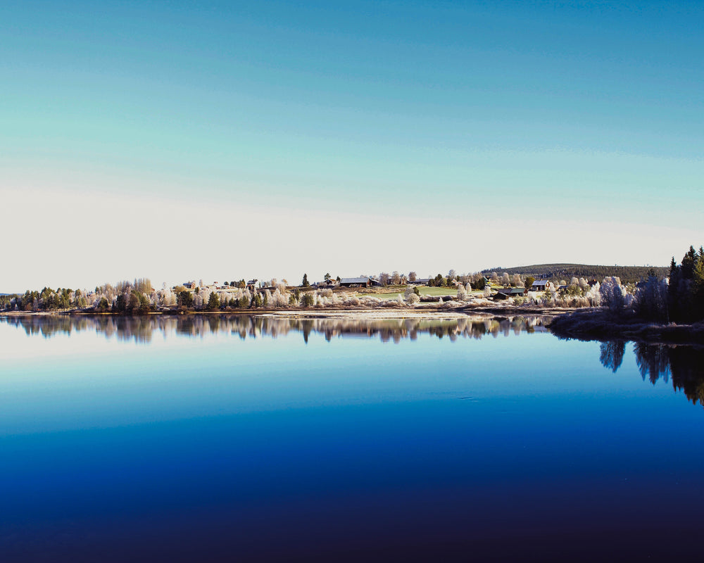 still lake reflects the landscape