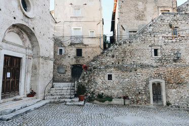 stone courtyard sorrounded by buildings