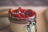 strawberries and cream in jar