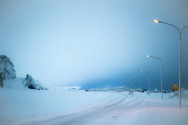 street lights glow in iceland winter