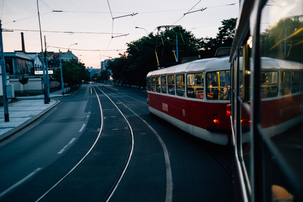 street with wires above and a street car to the right