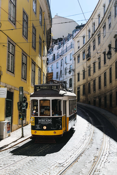 streetcar on winding lisbon road