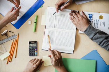 students working and studying flatlay