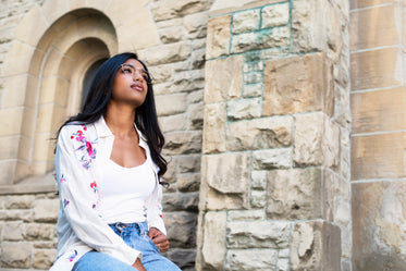 summer fashion near stone wall