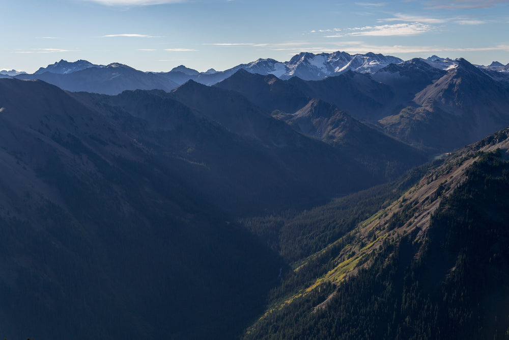 sunlight bounces across the mountain peaks