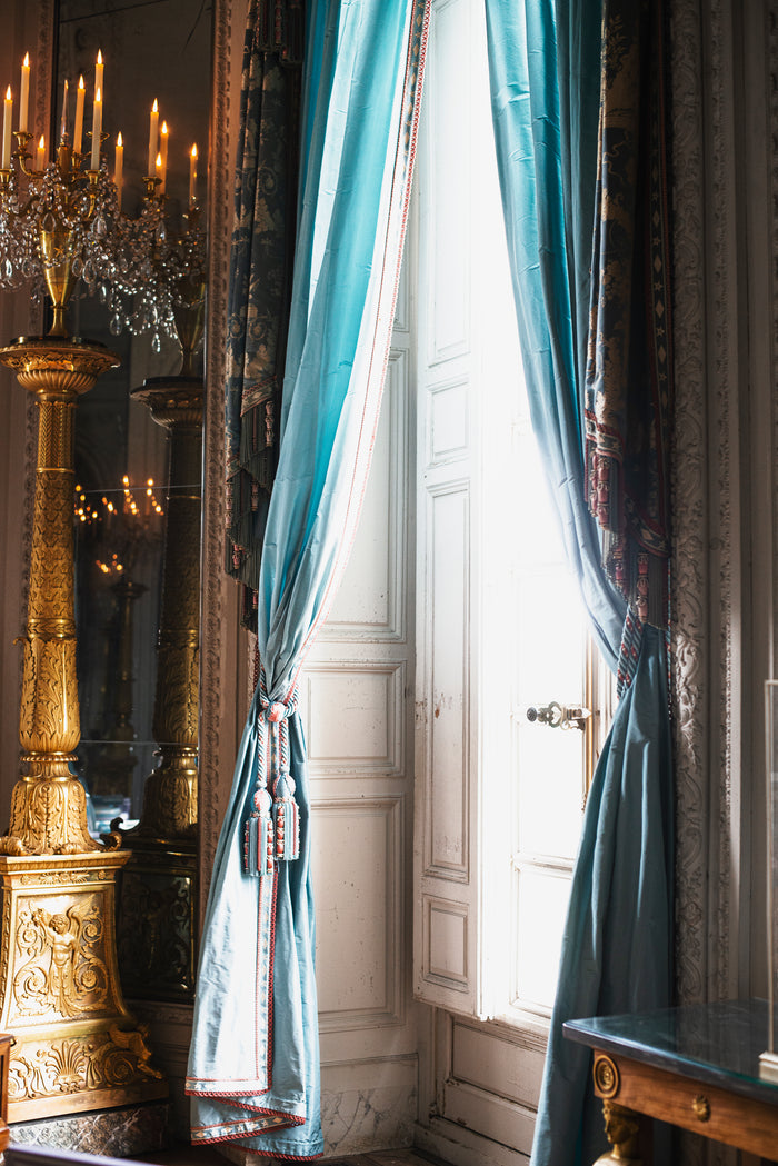 Late afternoon sunlight falling through an open window