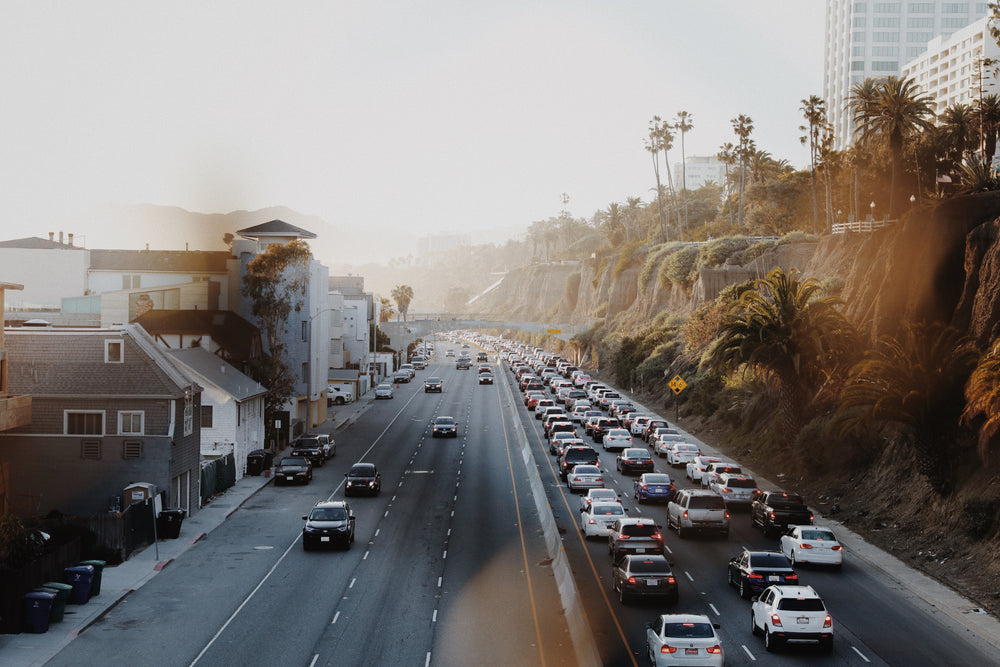 sunlight flares in an image of a highway