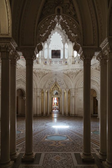 sunlight shines through stained glass window