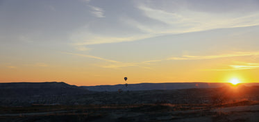 sunrise creeps over the horizon