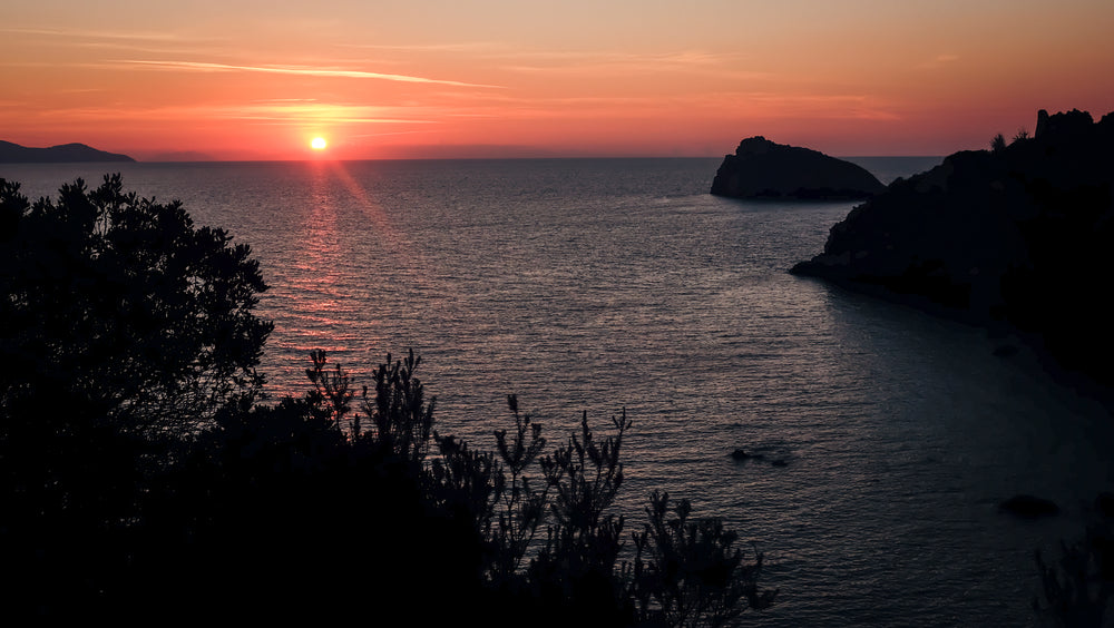 sunset glowing across lake