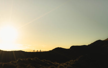 sunset hiking like ants marching