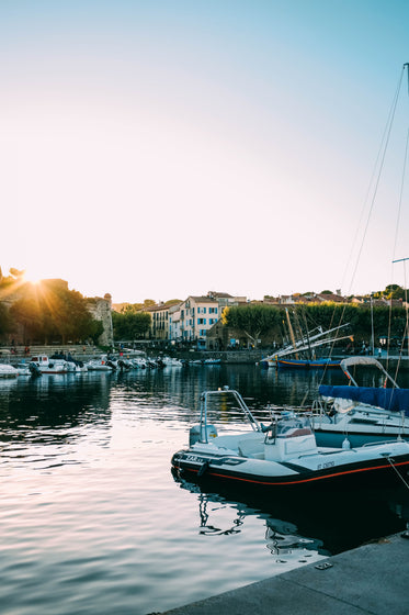 sunset over boats in a marina