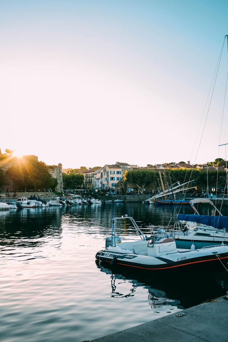 Sunset Over Boats In A Marina