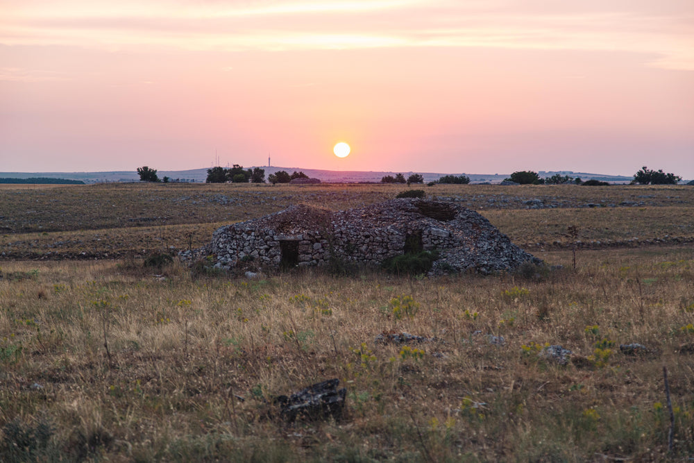 sunset over small pile of rubble