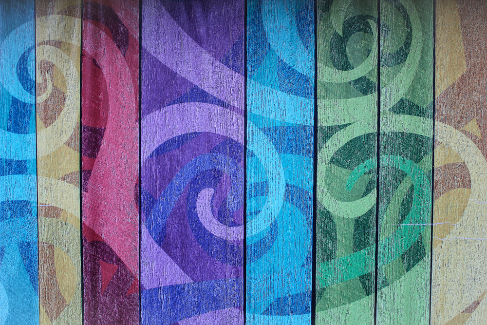 swirling painted fence