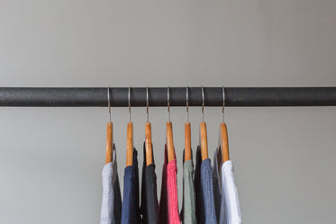 t shirts hanging on rack