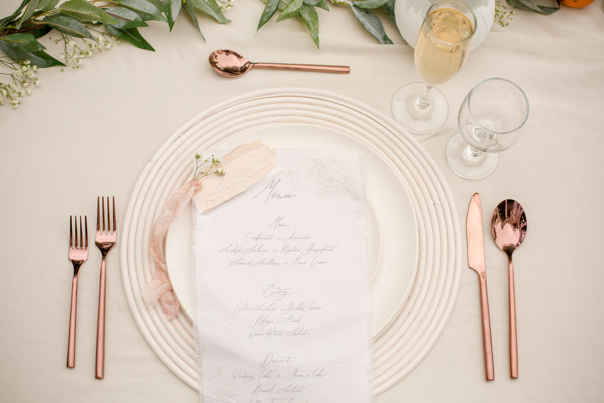 table setup with menu at wedding