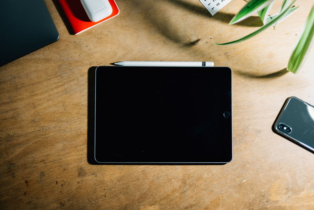 tablet and smartphone on table