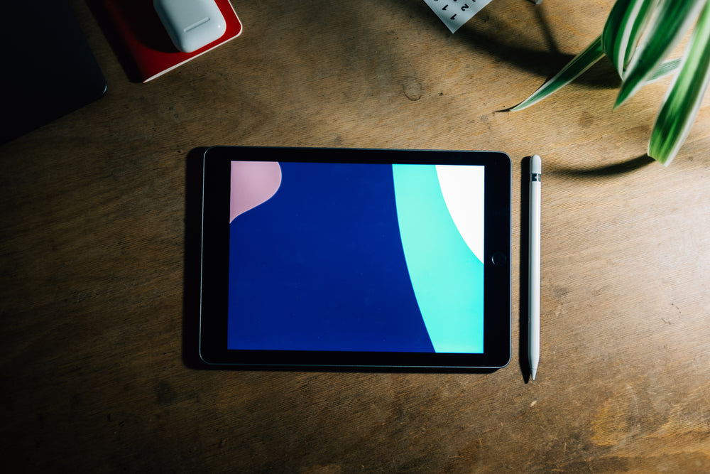 tablet on wooden desk